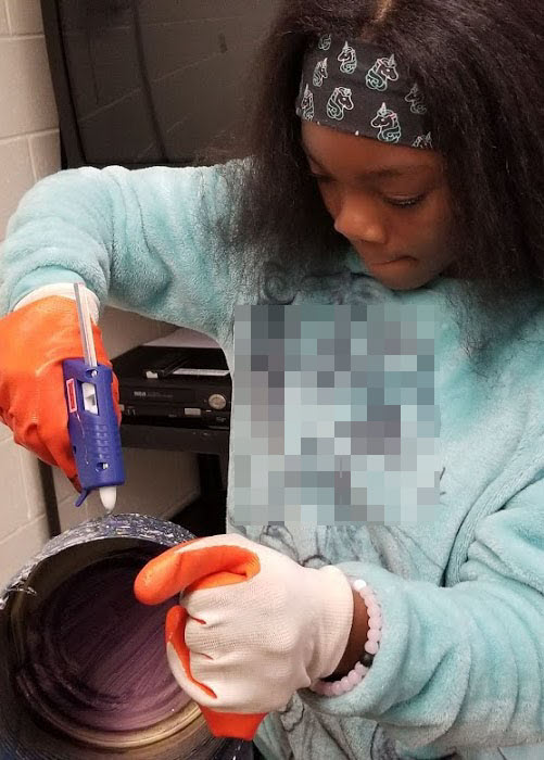 Image of student wearing protective gear Image of student wearing protective gear