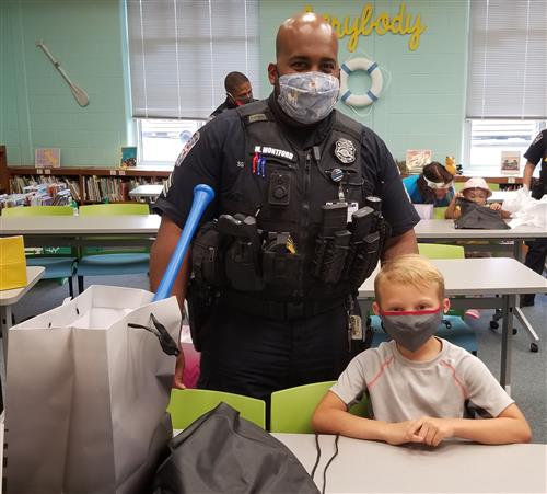 Fayetteville Police Department’s CARE Unit Surprises Students with Gifts 